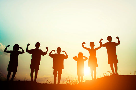 Group of children showing strength in silhouette, symbolizing emotional recovery MentalHealthEebooks